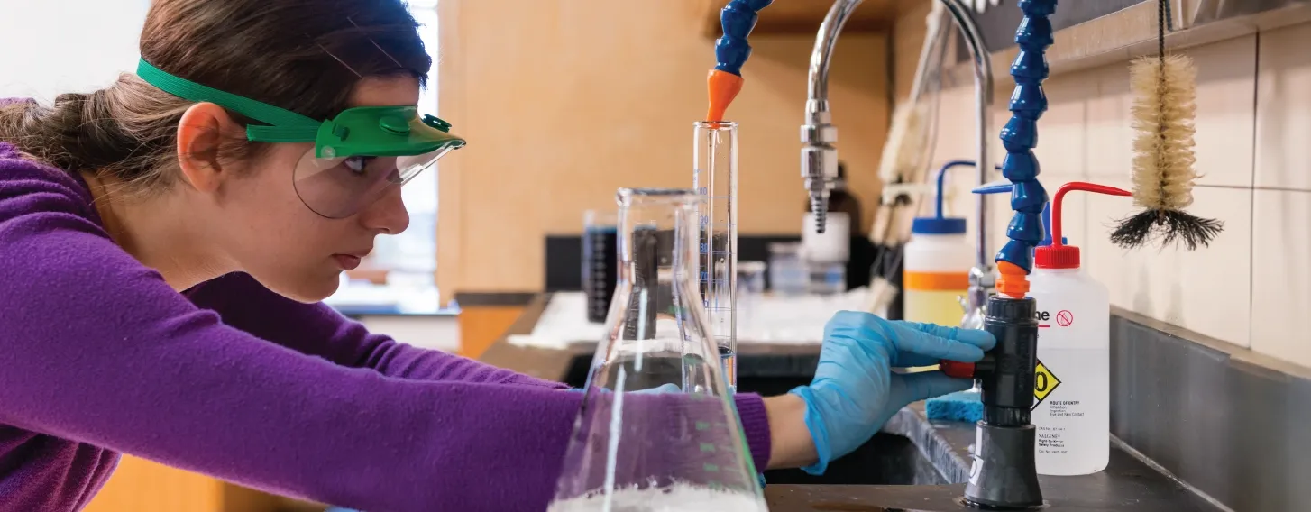 Student in biochemistry lab.